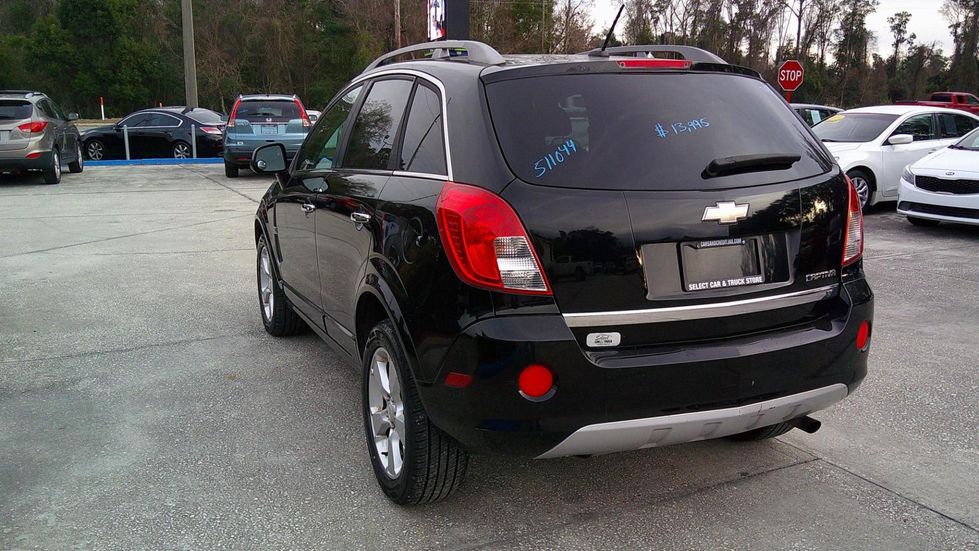 2015 BLACK CHEVROLET CAPTIVA SPORT 1LT (3GNAL3EK9FS) , located at 390 Hansen Avenue, Orange Park, FL, 32065, (904) 276-7933, 30.130497, -81.787529 - Photo#2