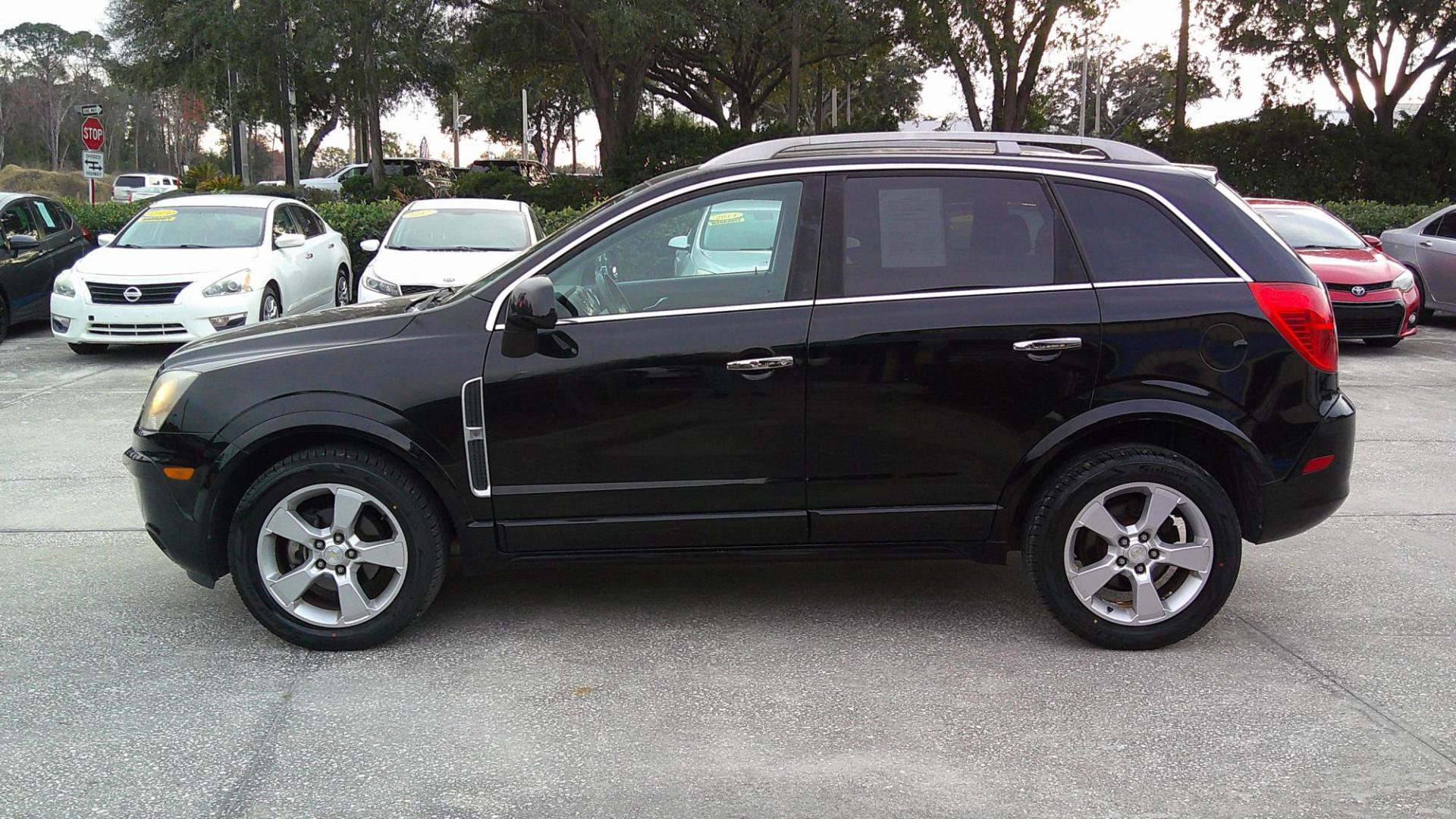 2015 BLACK CHEVROLET CAPTIVA SPORT 1LT (3GNAL3EK9FS) , located at 390 Hansen Avenue, Orange Park, FL, 32065, (904) 276-7933, 30.130497, -81.787529 - Photo#4