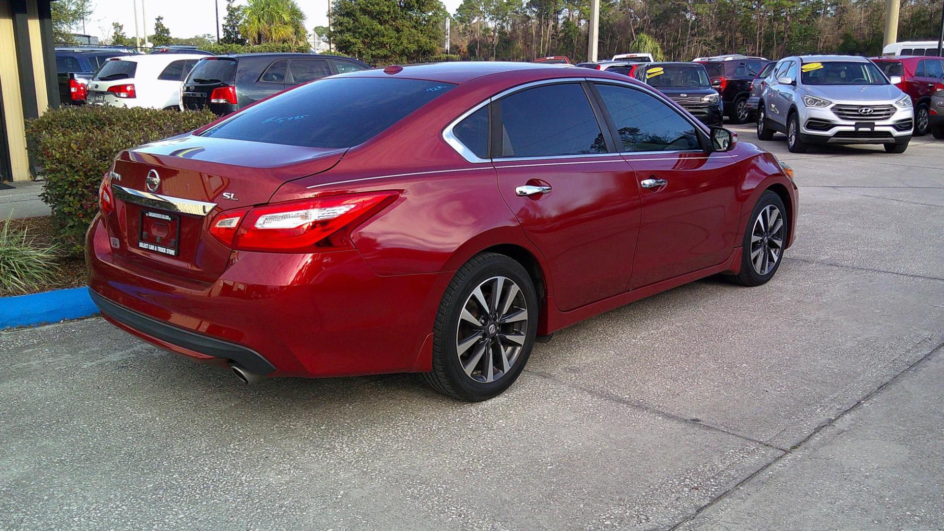 2016 RED NISSAN ALTIMA 2.5; 2.5 S; 2 (1N4AL3AP2GC) , located at 390 Hansen Avenue, Orange Park, FL, 32065, (904) 276-7933, 30.130497, -81.787529 - Photo#2