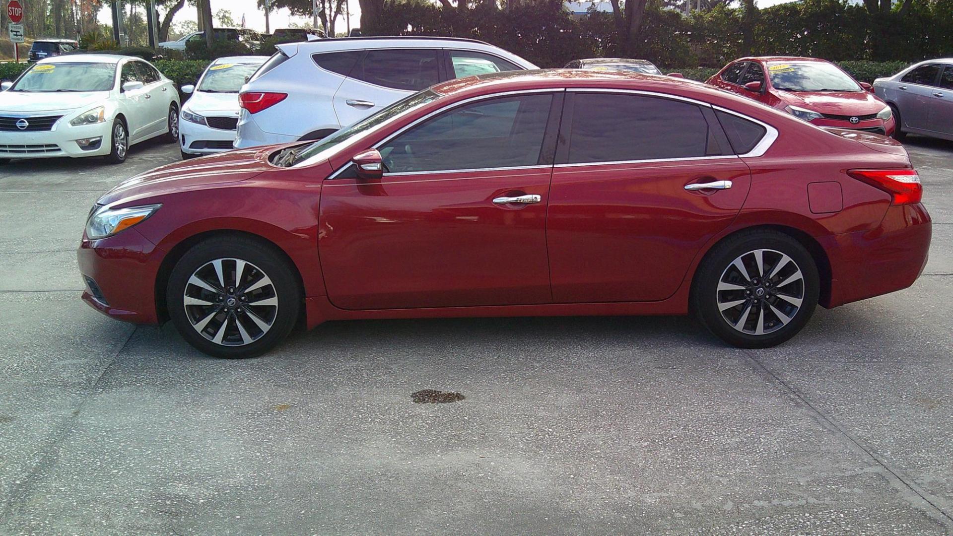 2016 RED NISSAN ALTIMA 2.5; 2.5 S; 2 (1N4AL3AP2GC) , located at 390 Hansen Avenue, Orange Park, FL, 32065, (904) 276-7933, 30.130497, -81.787529 - Photo#4