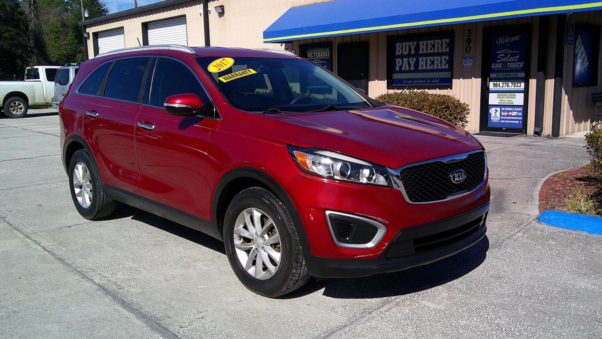 2017 RED KIA SORENTO LX; L (5XYPG4A30HG) , located at 390 Hansen Avenue, Orange Park, FL, 32065, (904) 276-7933, 30.130497, -81.787529 - Photo#0