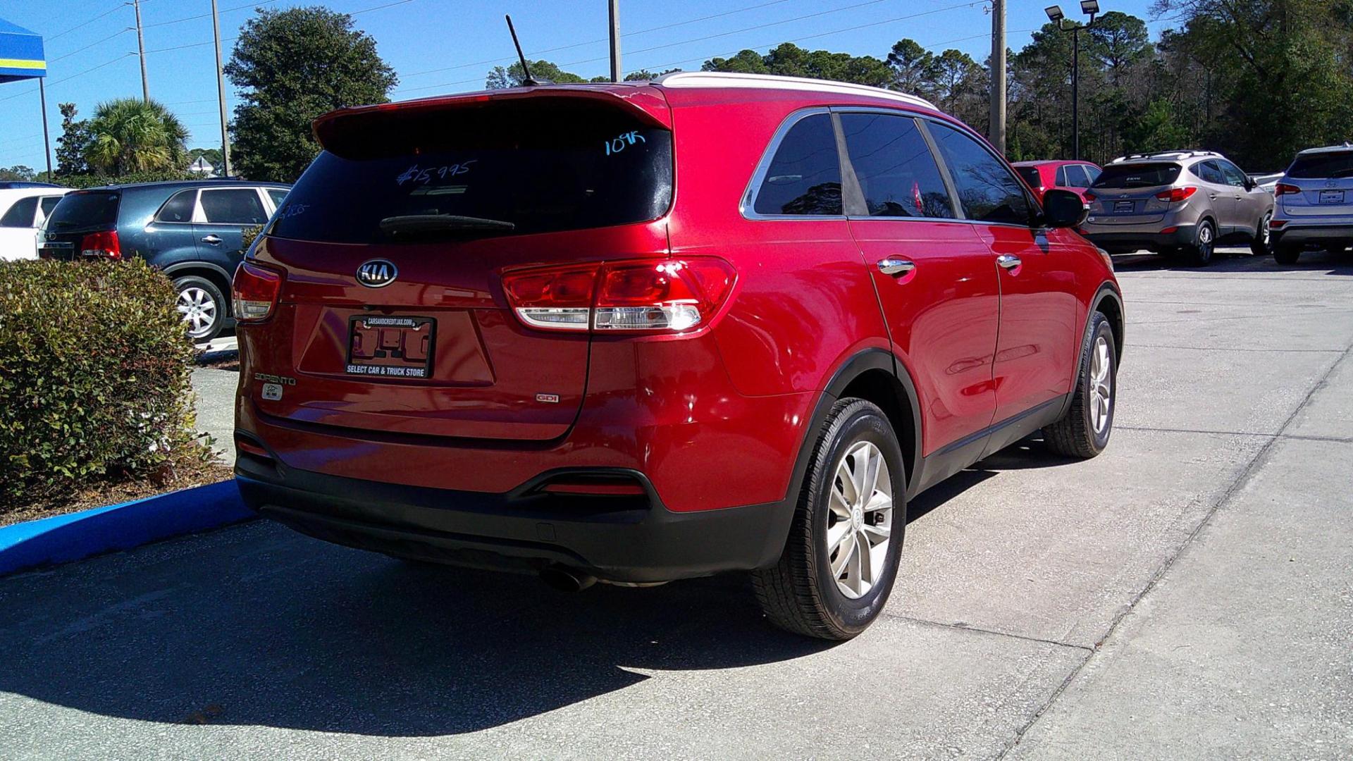 2017 RED KIA SORENTO LX; L (5XYPG4A30HG) , located at 390 Hansen Avenue, Orange Park, FL, 32065, (904) 276-7933, 30.130497, -81.787529 - Photo#2
