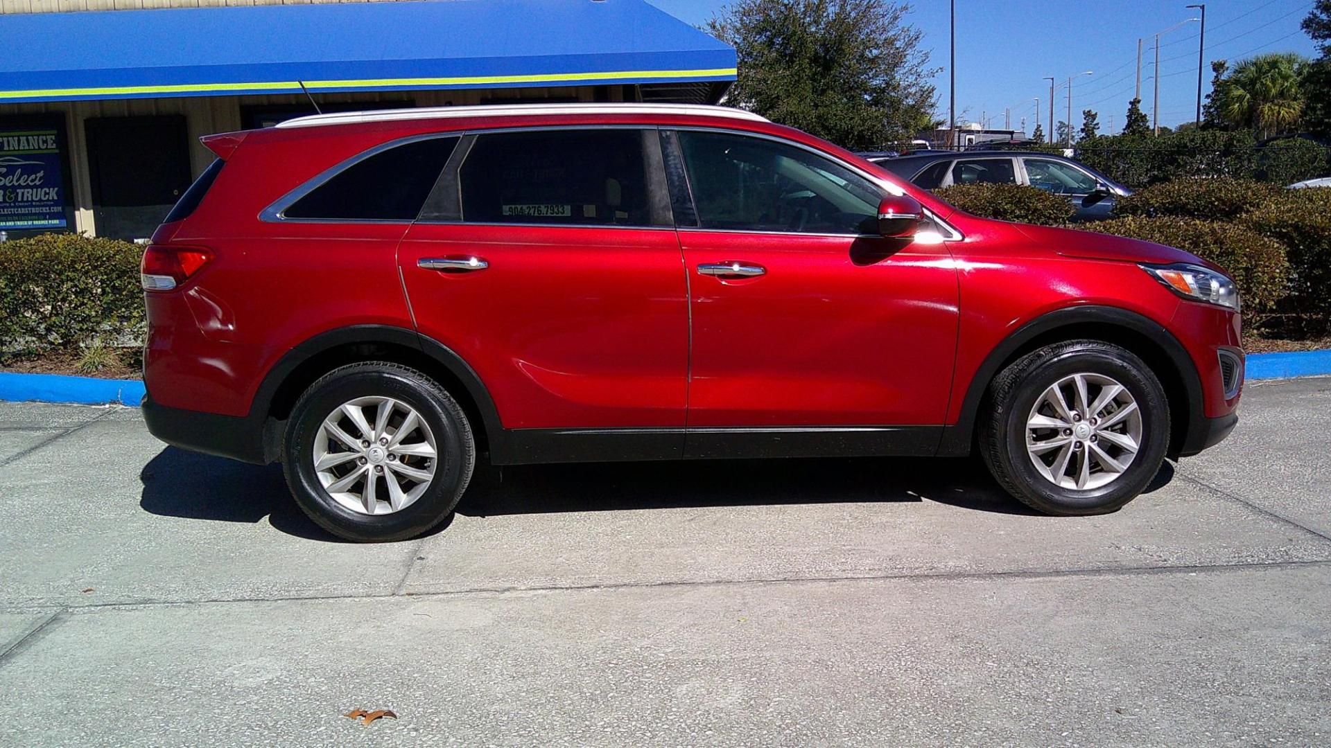 2017 RED KIA SORENTO LX; L (5XYPG4A30HG) , located at 390 Hansen Avenue, Orange Park, FL, 32065, (904) 276-7933, 30.130497, -81.787529 - Photo#4
