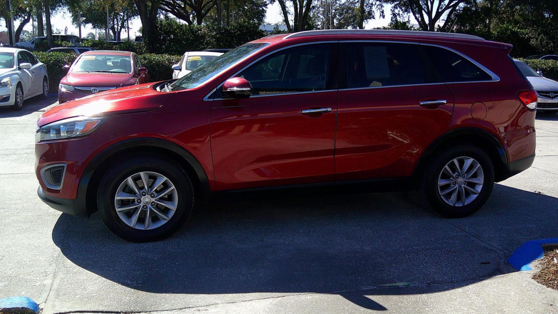 2017 RED KIA SORENTO LX; L (5XYPG4A30HG) , located at 390 Hansen Avenue, Orange Park, FL, 32065, (904) 276-7933, 30.130497, -81.787529 - Photo#5