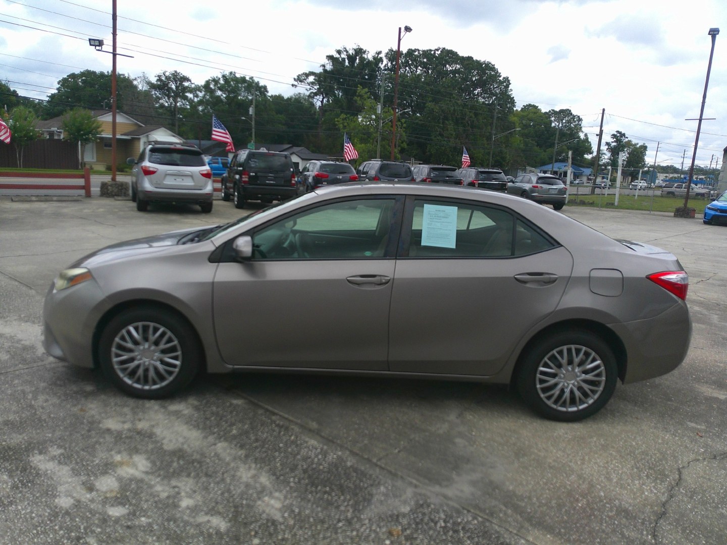 2015 BROWN TOYOTA COROLLA S; LE; L (5YFBURHE6FP) , located at 1200 Cassat Avenue, Jacksonville, FL, 32205, (904) 695-1885, 30.302404, -81.731033- Photo#1