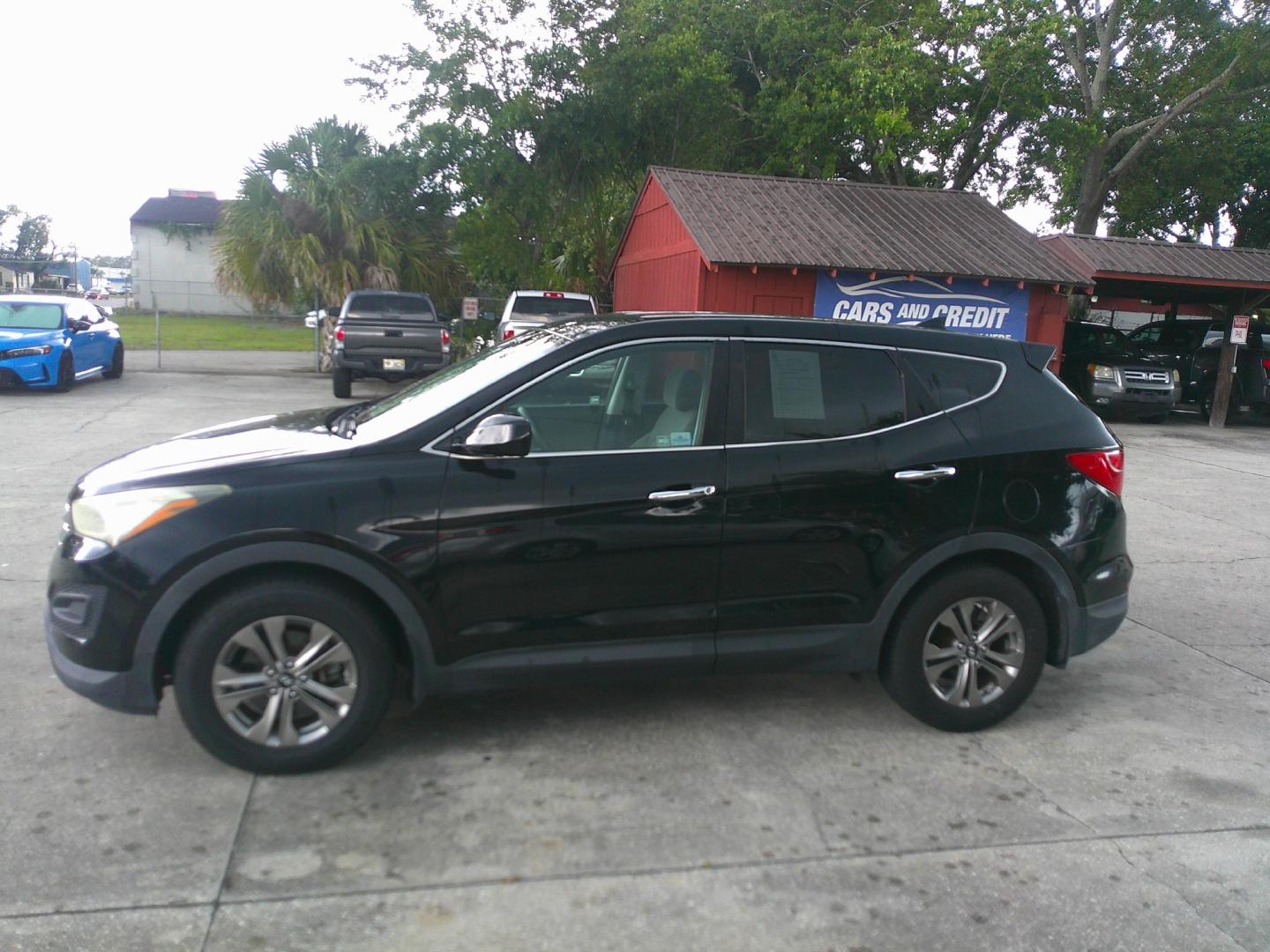 2016 BLACK HYUNDAI SANTA FE SPORT BASE (5XYZT3LB1GG) , located at 1200 Cassat Avenue, Jacksonville, FL, 32205, (904) 695-1885, 30.302404, -81.731033- Photo#1