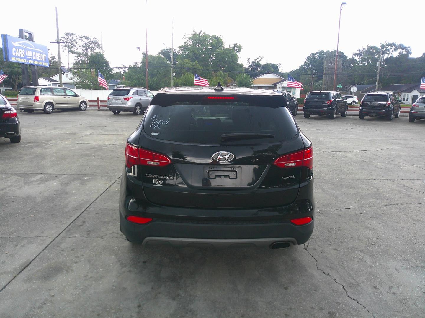 2016 BLACK HYUNDAI SANTA FE SPORT BASE (5XYZT3LB1GG) , located at 1200 Cassat Avenue, Jacksonville, FL, 32205, (904) 695-1885, 30.302404, -81.731033- Photo#3