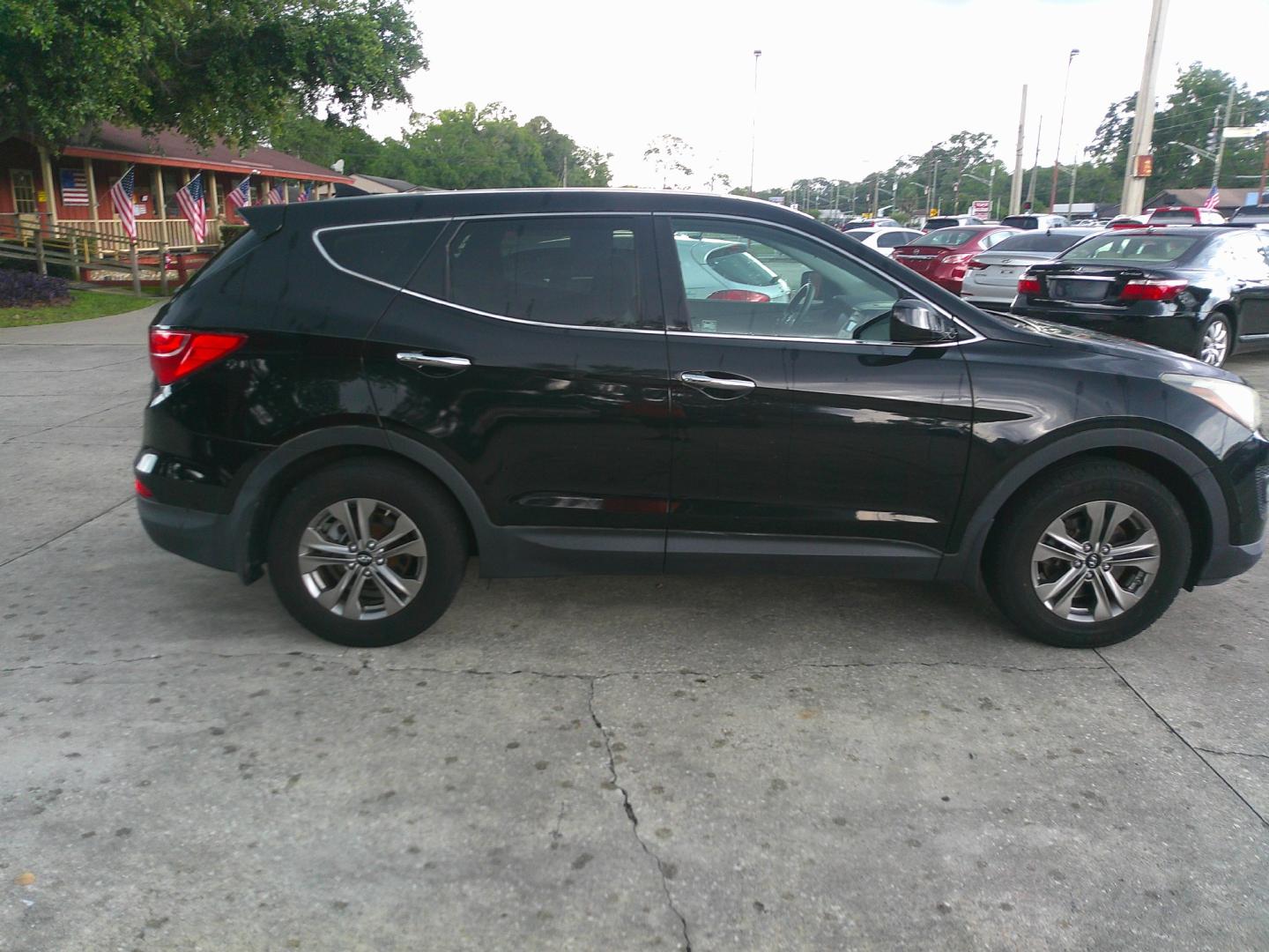 2016 BLACK HYUNDAI SANTA FE SPORT BASE (5XYZT3LB1GG) , located at 1200 Cassat Avenue, Jacksonville, FL, 32205, (904) 695-1885, 30.302404, -81.731033- Photo#4