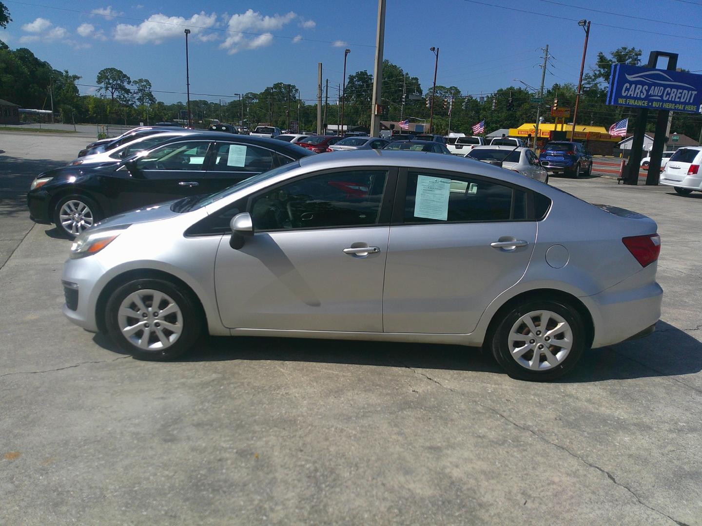 2016 SILVER KIA RIO LX (KNADM4A38G6) , located at 1200 Cassat Avenue, Jacksonville, FL, 32205, (904) 695-1885, 30.302404, -81.731033- Photo#1
