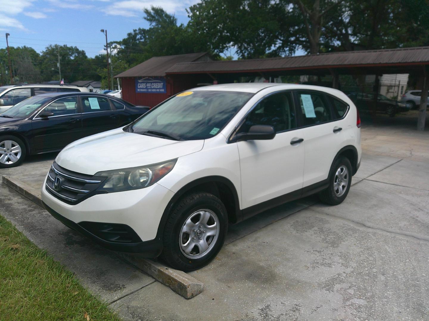 2014 WHITE HONDA CR-V LX (5J6RM4H38EL) , located at 390 Hansen Avenue, Orange Park, FL, 32065, (904) 276-7933, 30.130497, -81.787529- Photo#1