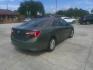 2014 GREEN TOYOTA CAMRY SE; LE; XLE; L (4T1BF1FK3EU) , located at 1200 Cassat Avenue, Jacksonville, FL, 32205, (904) 695-1885, 30.302404, -81.731033- Photo#2
